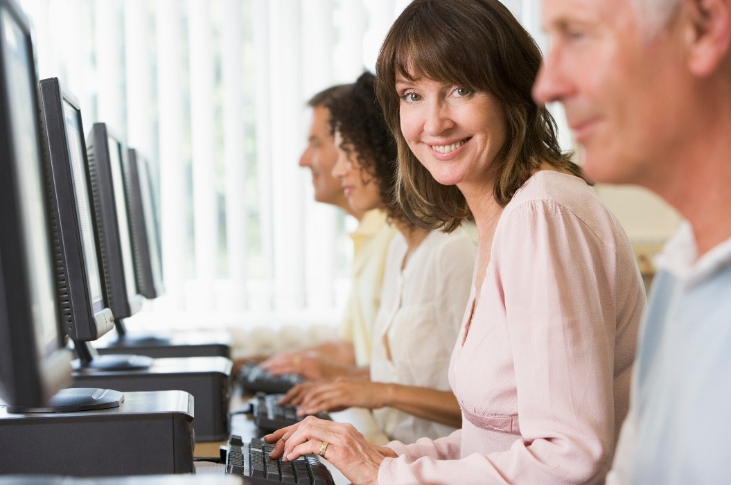 Adult students in a computer lab